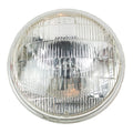 Classic and Sportscar Spares JLM9603 5 3/4" headlamp with 12V 60/37.5 bulbs, showcasing its round glass lens and chrome housing.