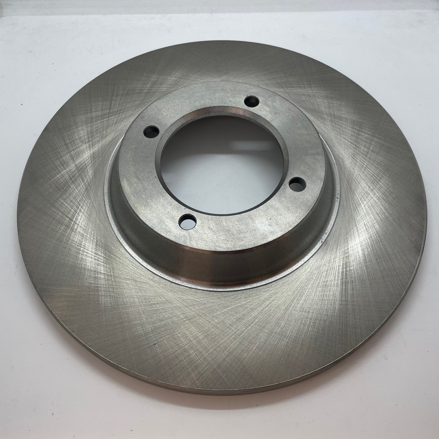 Brake disc for Triumph TR4-6, showing detailed surface and design, suitable for classic car restoration.