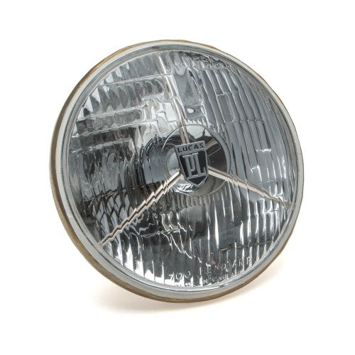 Classic and Sportscar Spares Lucas 7" RHD headlamp with PL700 tripod for vintage vehicles, showcasing its sleek design.