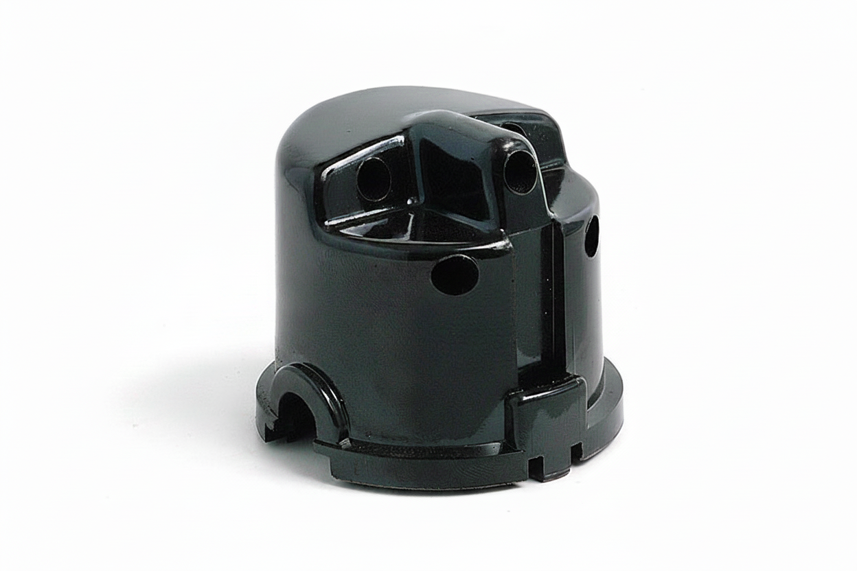 DDB101 distributor cap for 4-cylinder side entry in MGA, MGB, Sprite, featuring durable construction and precise fit.