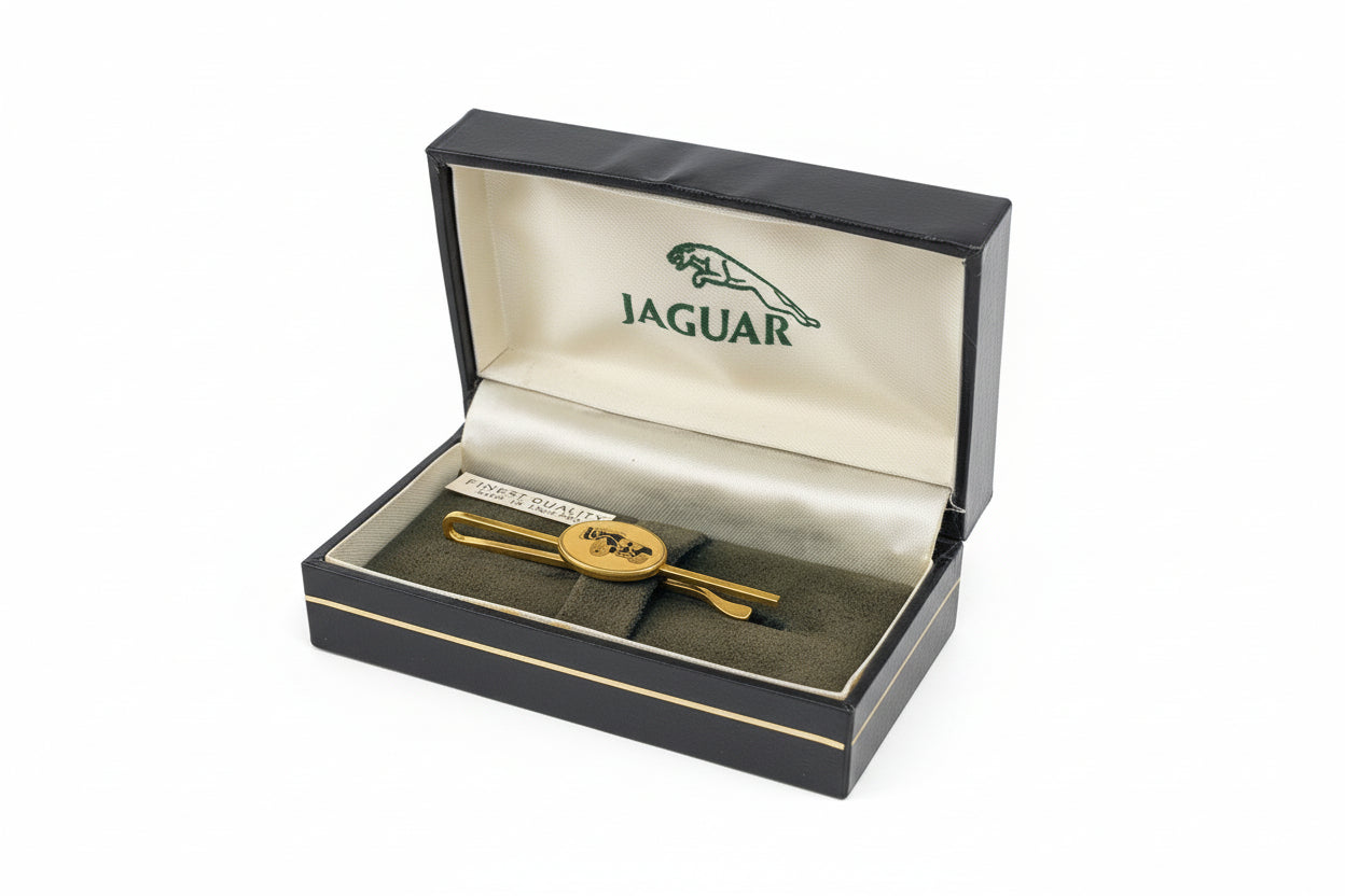 Classic and Sportscar Spares gift box with assorted automotive-themed items and a decorative bow.
