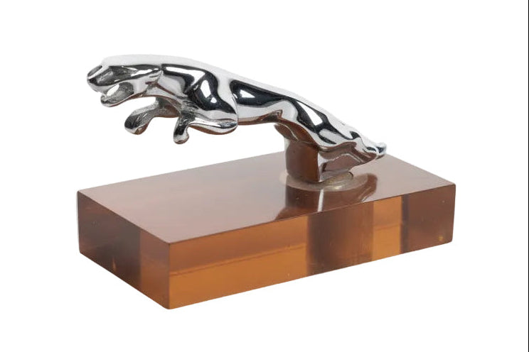 Classic and Sportscar Spares gift box with various automotive-themed items displayed on a wooden surface.