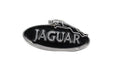Classic and Sportscar Spares gift box with assorted automotive-themed items on a wooden surface.