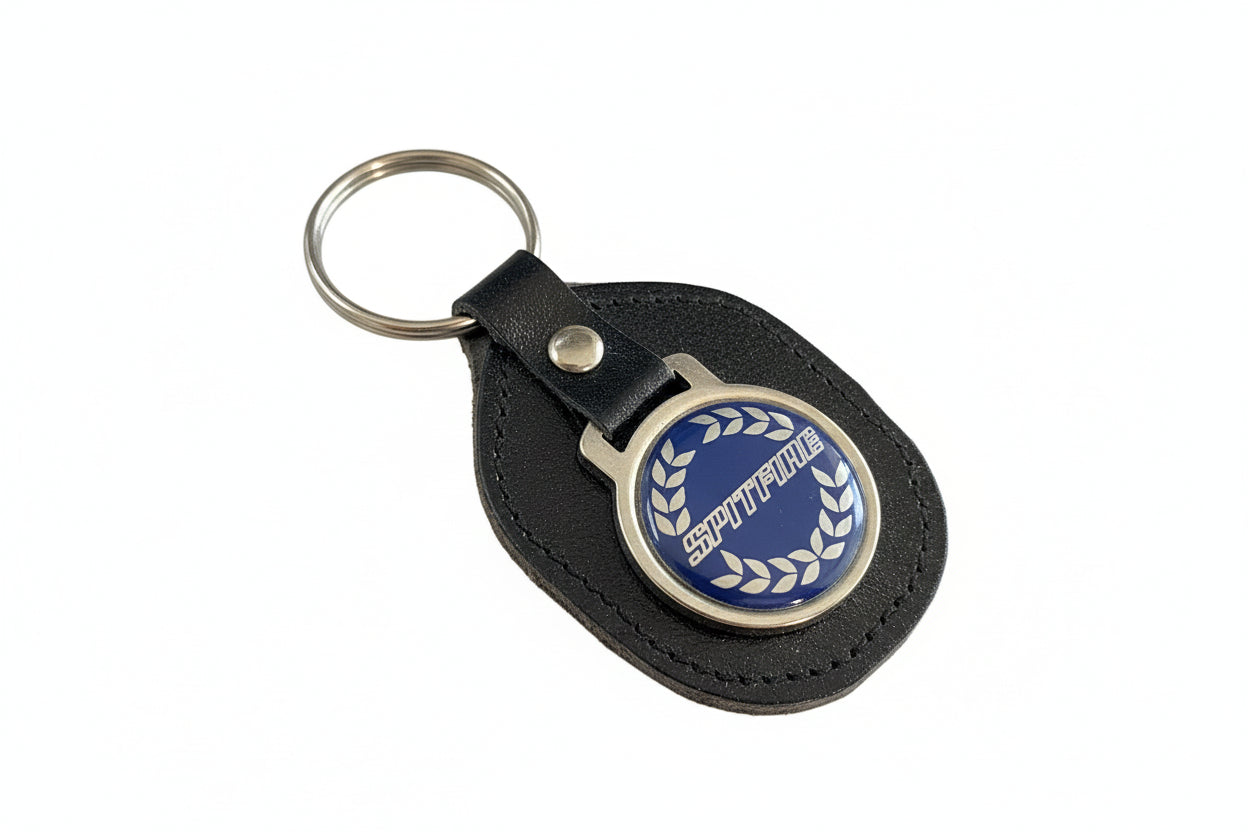 Classic and Sportscar Spares Spitfire keyring featuring a detailed design of the iconic car model in metal.