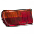 Jaguar V12 E1 L807/54780 Lucas type rear lamp with clear lens and chrome housing, showcasing design and detail.