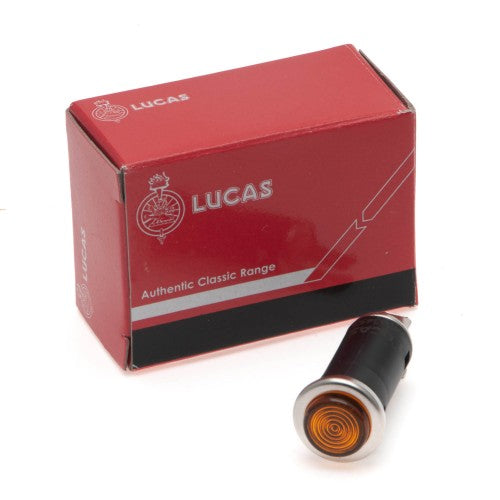 SPB357 Lucas amber warning lamp, push fit design, suitable for 13mm hole, showcasing its bright light and sturdy build.