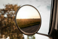 Classic and Sportscar Spares mirror with a sleek design, showcasing reflective surface and elegant frame.